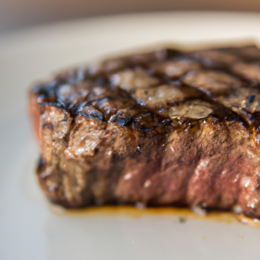 A perfectly grilled steak served on a plate